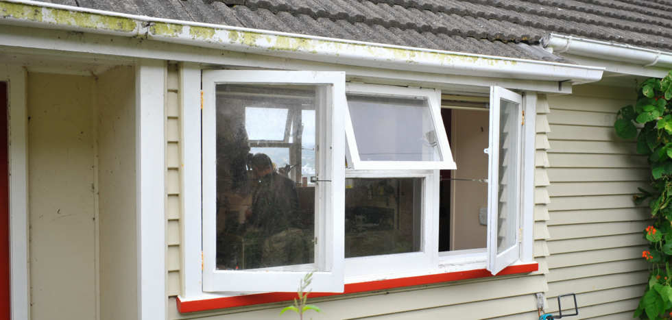 House with open windows for ventilation